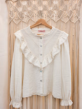 Camisa folhos